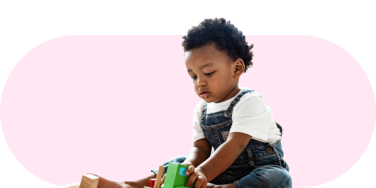 toddler boy playing